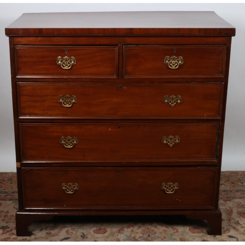 53 - A 19TH CENTURY MAHOGANY CHEST of rectangular outline the shaped top above two short and three long g... 