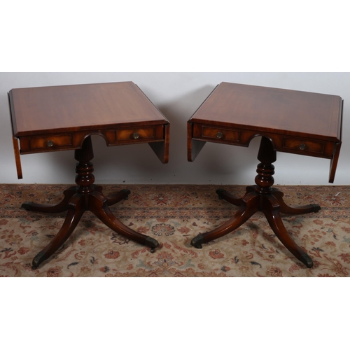 54 - A PAIR OF GEORGIAN DESIGN MAHOGANY SOFA TABLES each with rectangular hinged top above two short frie... 