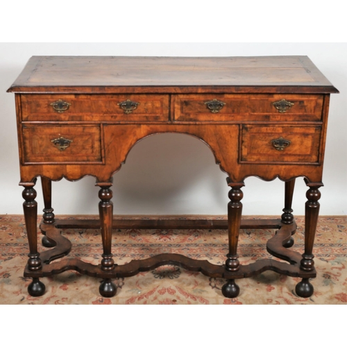 71 - A 19TH CENTURY WILLIAM AND MARY DESIGN WALNUT crossbanded and herringbone inlaid lowboy the rectangu... 