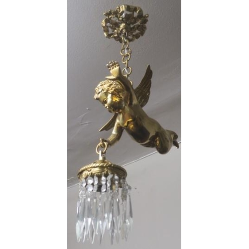 837 - A PAIR OF CONTINENTAL GILT BRASS AND CUT GLASS FIGURAL CENTRE LIGHTS each in the form of a winged ch... 