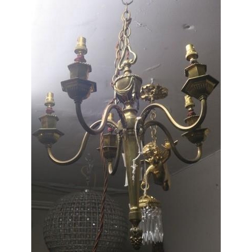 838 - A BRASS ADAMS DESIGN 5 LIGHT CHANDELIER with scroll arms and pineapple finial 
62 cm drop, 41 cm (w)