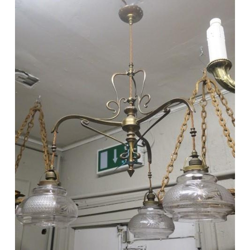 842 - A VINTAGE BRASS AND CUT GLASS THREE BRANCH CHANDELIER the scroll arms with star cut glazed shades 
8... 