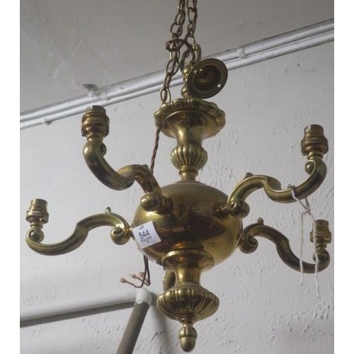 844 - A 19TH CENTURY BRASS THREE BRANCH CHANDELIER with scroll arms and brass chain suspension 
50cm drop ... 