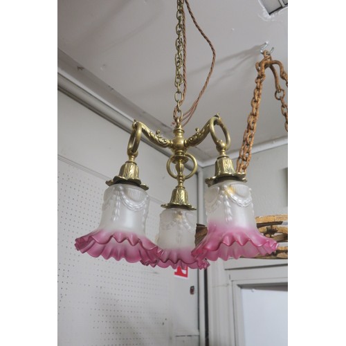 841 - A 19TH CENTURY BRASS FROSTED GLASS AND RUBY GLASS THREE BRANCH CHANDELIER with foliate cast scroll a... 