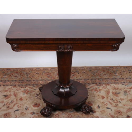 70 - A 19TH CENTURY ROSEWOOD FOLDOVER SUPPER TABLE the rectangular hinged top  with carved frieze raised ... 