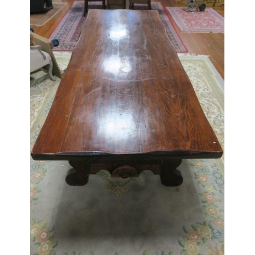 80 - A GOOD PINE REFECTORY DESIGN TABLE of rectangular outline the shaped top on pierced end stand suppor... 