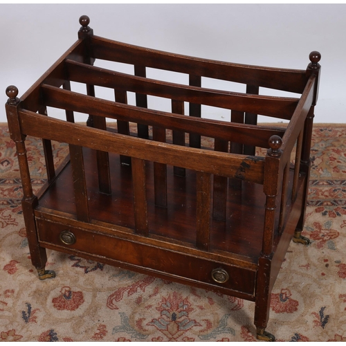 112 - A GEORGIAN DESIGN MAHOGANY FOUR COMPARTMENT CANTERBURY with slatted uprights the base containing one... 