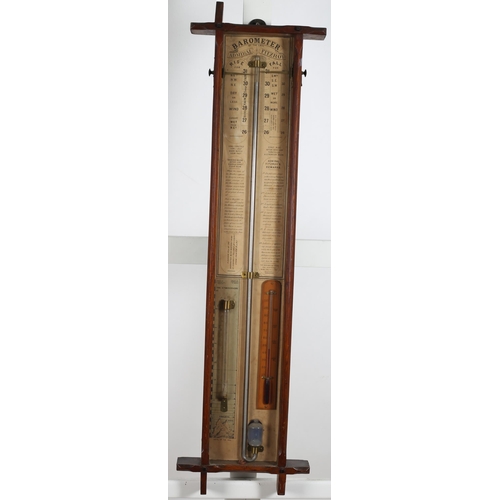 492 - AN ADMIRAL FITZROY ARTS AND CRAFTS OAK CASED BAROMETER AND THERMOMETER in a rectangular case
102cm (... 