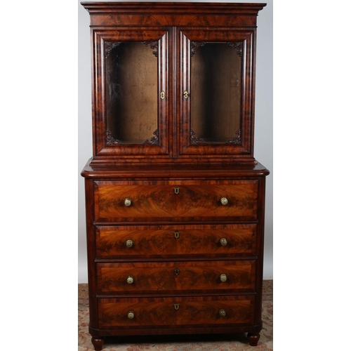 497 - A BIEDERMEIER MAHOGANY SECRETAIRE BOOKCASE with moulded cornice above a pair of glazed doors contain... 