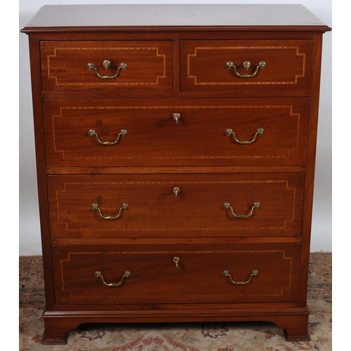 498 - A GEORGIAN DESIGN MAHOGANY AND SATINWOOD INLAID CHEST of rectangular outline the shaped top above tw... 