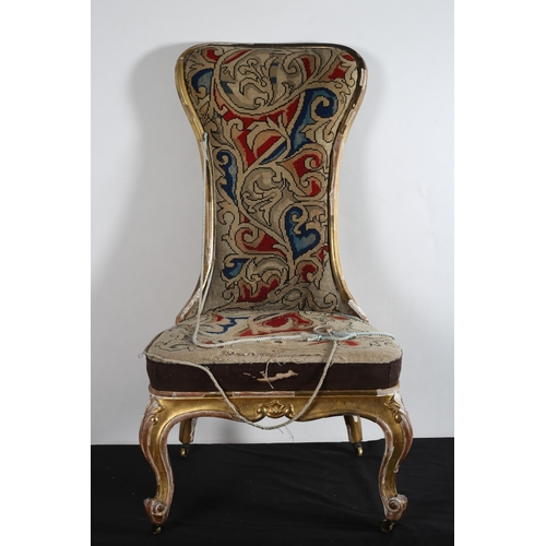 512 - A 19TH CENTURY GILTWOOD AND NEEDLEWORK UPHOLSTERED SIDE CHAIR the shaped top rail above an upholster... 