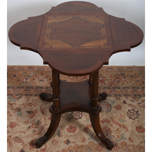 516 - A CONTINENTAL KINGWOOD AND PARQUETRY DROP LEAF TABLE a rectangular top with shaped leaves raised on ... 