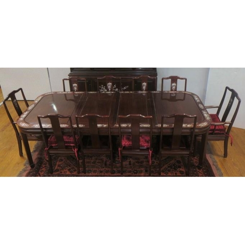 524 - A TWELVE PIECE ROSEWOOD AND MOTHER OF PEARL INLAID DINING ROOM SUITE comprising ten chairs including... 