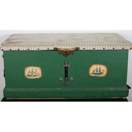 525 - A VINTAGE PINE AND UPHOLSTERED TRUNK of rectangular outline the hinged lid with upholstered panel an... 