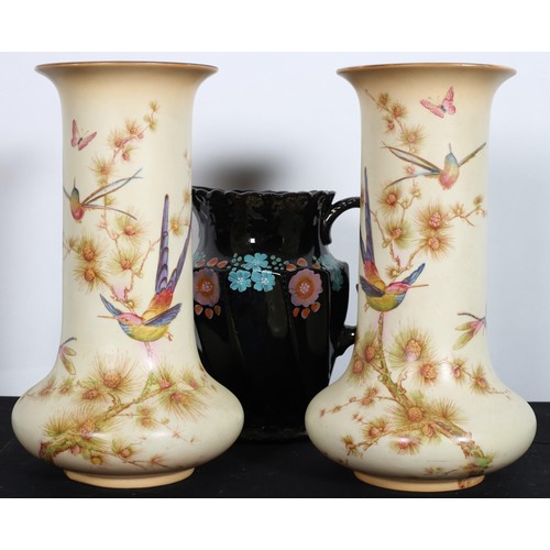 588 - A PAIR OF 19TH CENTURY BRASS VASES each of baluster form overlaid with dragons on a circular foot wi... 