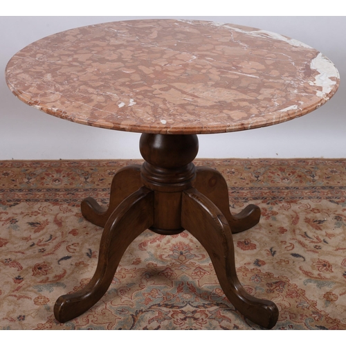 695 - A MAHOGANY AND MARBLE TOP TABLE the circular veined marble top above a baluster column on quadruped ... 