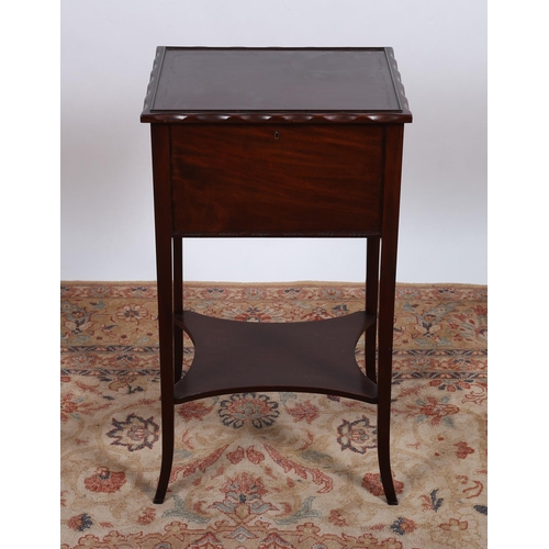 703 - AN EDWARDIAN MAHOGANY WORKBOX of square form the hinged lid containing a slide tray above a moulded ... 