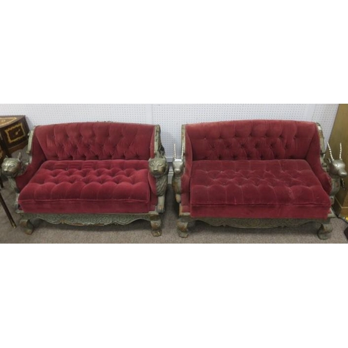 704 - A PAIR OF EASTERN CARVED WOOD AND SILVERED NURSERY SETTEES with deep buttoned upholstered back and s... 