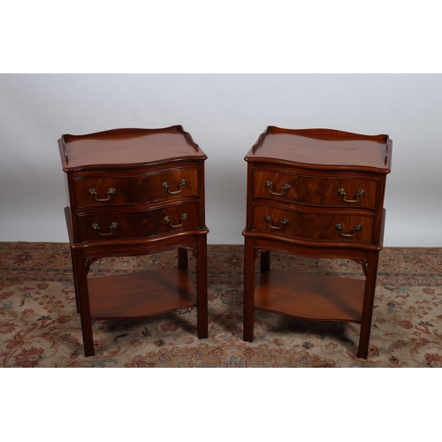 705 - A PAIR OF GEORGIAN DESIGN MAHOGANY LAMP TABLES each of serpentine outline with moulded galleries abo... 