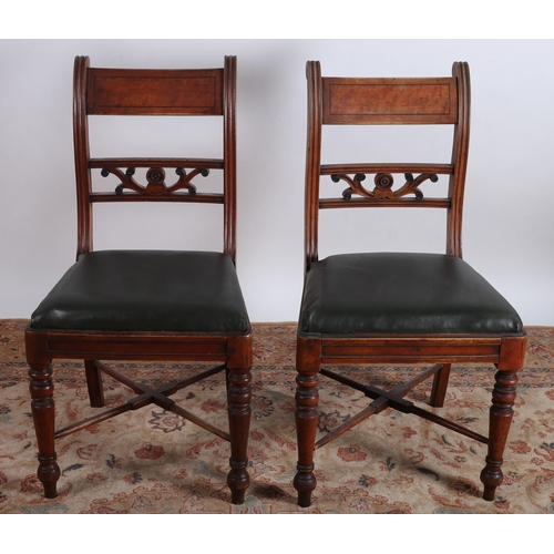 711 - A PAIR OF REGENCY DESIGN MAHOGANY DINING CHAIRS each with carved top rail and pierced splat with uph... 