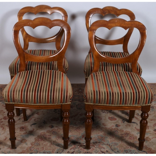 740 - A SET OF FOUR 19TH CENTURY MAHOGANY DINING CHAIRS each with shaped top rail and splat with upholster... 