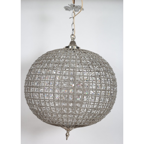 894 - A CONTINENTAL SILVERED AND CUT GLASS CENTRE LIGHT of bulbous outline inset with faceted pendants the... 