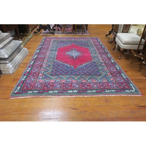 929 - A TURKISH KILEM WOOL RUG the multicoloured ground with central panel filled with serrated panels, pa... 