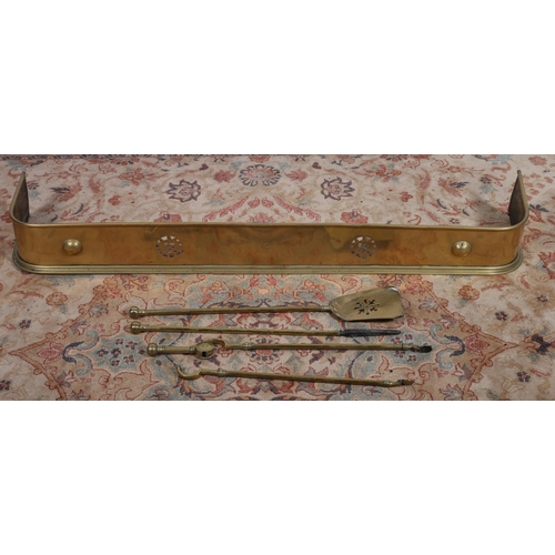 731 - A 19TH CENTURY BRASS FENDER WITH PIERCED FRIEZE ON A STEPPED PLATFORM together with a set of three 1... 