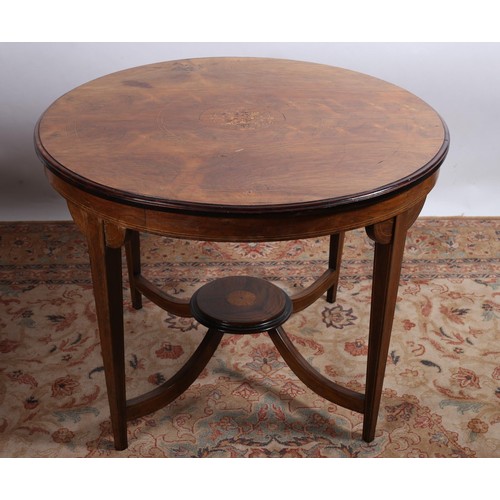 717 - A LATE 19TH CENTURY ROSEWOOD AND MARQUETRY INLAID TABLE of circular outline the shaped top raised on... 