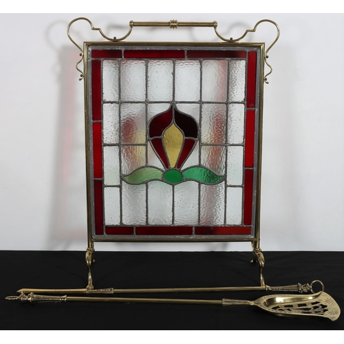 116 - A VINTAGE BRASS, LEAD GLASS, CLEAR GLASS AND COLOURED GLASS FIRESCREEN of rectangular outline with c... 