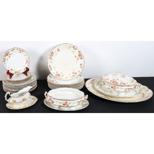 125 - A THIRTY FIVE PIECE BURSLEM CHINA DINNER SERVICE the white ground with floral border comprising dinn... 