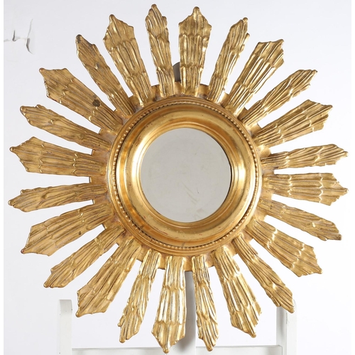 571 - A CONTINENTAL GILT FRAME SUN BURST MIRROR with circular bevelled glass plate 
72cm (d)