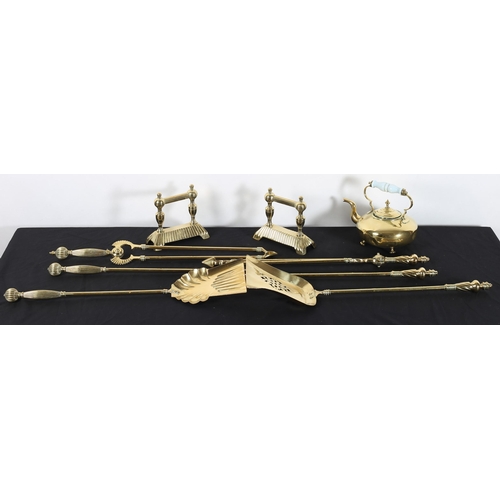 616 - TWO SETS OF BRASS FIRE IRONS comprising poker, shovel and tongs together with a pair of brass fire d... 