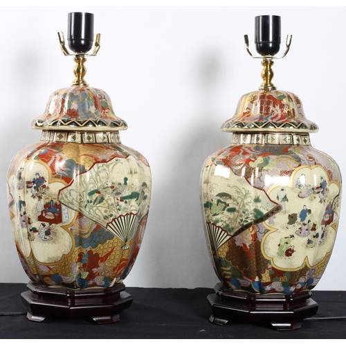 651 - A PAIR OF GLAZED CHINA TABLE LAMPS Chinese design each of octagonal bulbous form on hardwood stands ... 