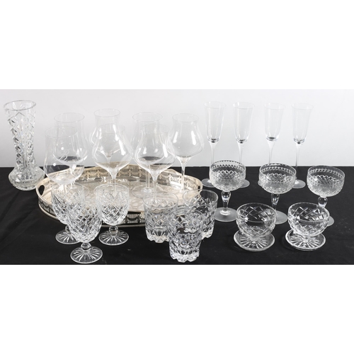 654 - A COLLECTION OF GLASSWARE to include wine glasses, tumblers, cut glass vase together with a plated t... 