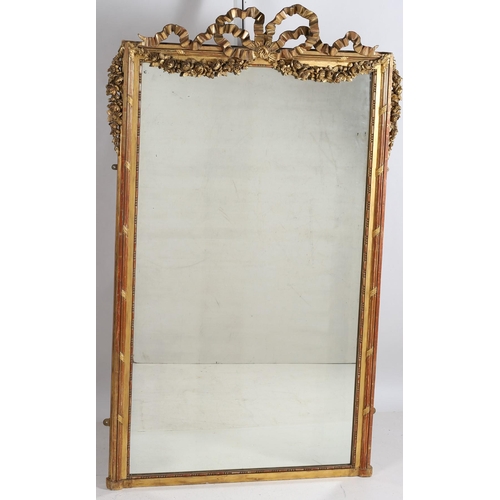 661 - A 19TH CENTURY CONTINENTAL GILTWOOD AND GESSO MIRROR the rectangular plate within a strapwork frame ... 