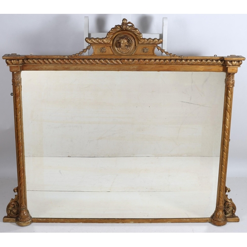 662 - A 19TH CENTURY CONTINENTAL GILTWOOD AND GESSO OVERMANTLE MIRROR the rectangular plate within a spira... 