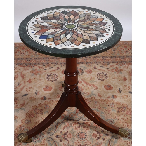 667 - A CONTINENTAL MAHOGANY SPECIMEN MARBLE TABLE of circular outline inlaid with specimen marbles and ha... 