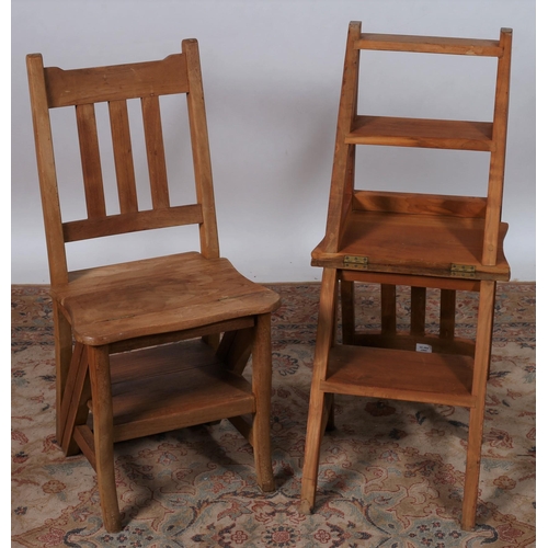 680 - A PAIR OF VINTAGE HARDWOOD METAMORPHIC CHAIRS each with a shaped top rail and slatted back with hing... 