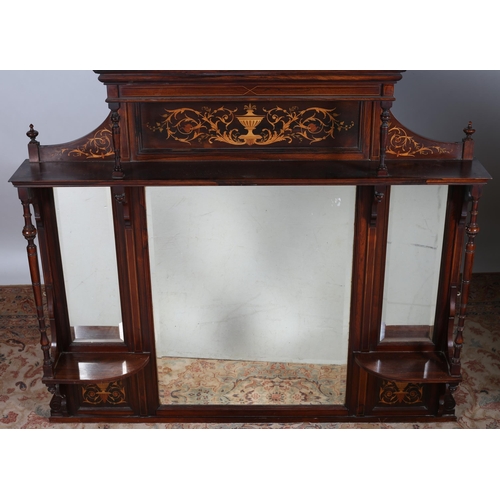 688 - AN EDWARDIAN ROSEWOOD AND MARQUETRY COMPARTMENT OVERMANTLE MIRROR the moulded cornice above an inlai... 