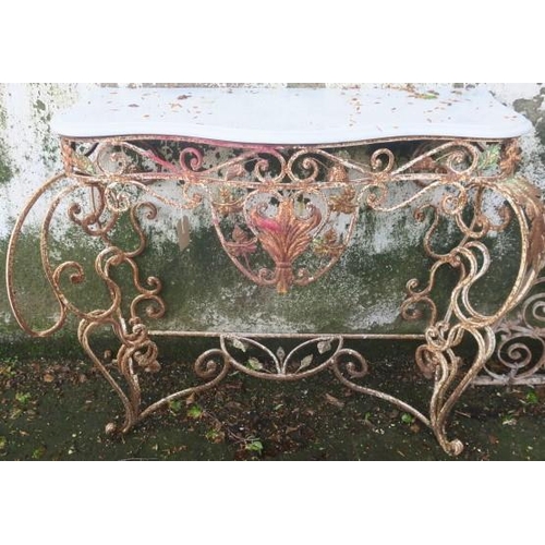 809 - A WROUGHT IRON CONSOLE TABLE of serpentine outline surmounted by a white veined marble top above a p... 