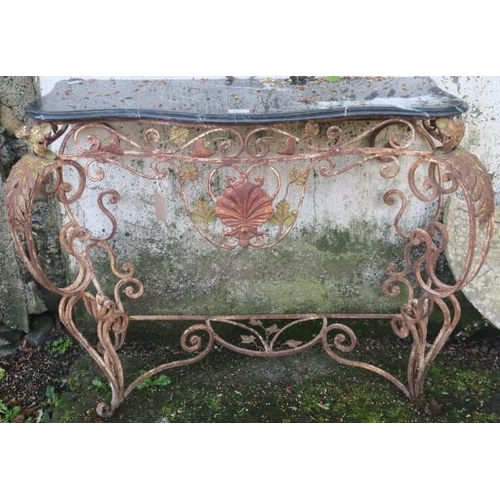 811 - A WROUGHT IRON CONSOLE TABLE surmounted by a veined marble top above a pierced C-scroll and foliate ... 