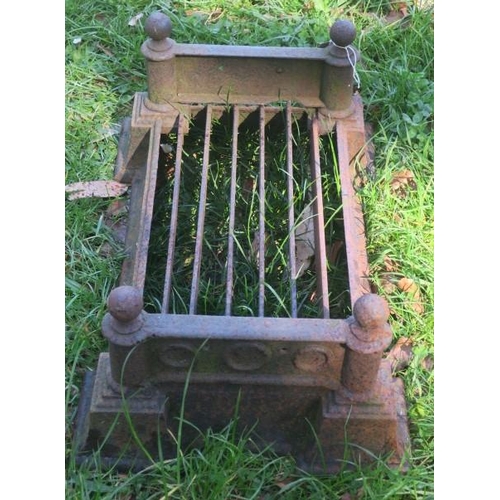 845 - A 19TH CENTURY CAST IRON FOOTSCRAPE of rectangular outline with spherical finials above a stepped ba... 