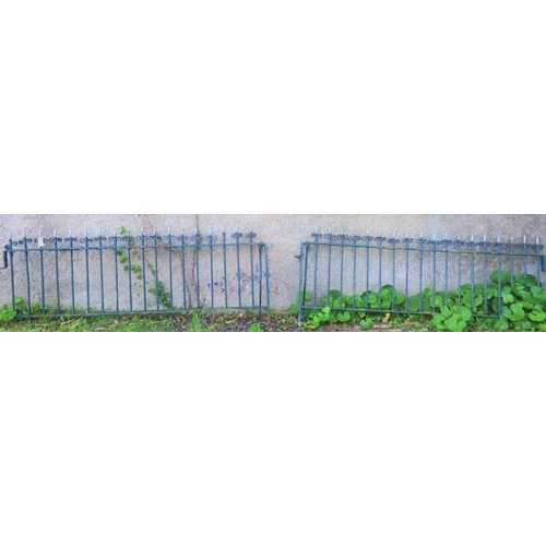 868 - A CAST IRON AND WROUGHT IRON RAILING of rectangular outline with scroll and pointed finials and cyli... 