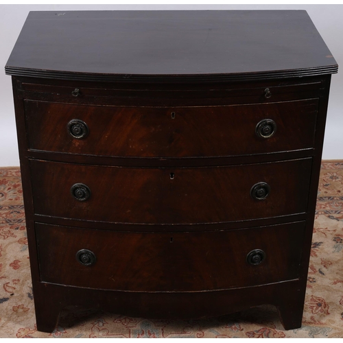 882 - A GEORGIAN DESIGN MAHOGANY CHEST of rectangular bowed outline the shaped top with reeded rim above a... 