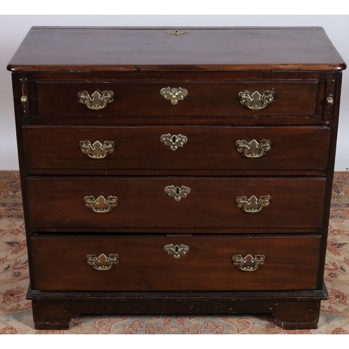 887 - A GEORGIAN MAHOGANY CHEST of rectangular outline the hinged top above a mock drawer above three long... 