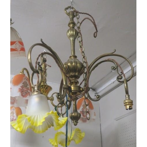 904 - A VINTAGE BRASS THREE BRANCH CHANDELIER the knopped column issuing three pierced scroll arms with fr... 