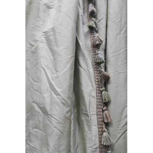 941 - A PAIR OF NARROW DRESS CURTAINS with matching tie backs and fringe detail on leading edge. 
Matches ... 