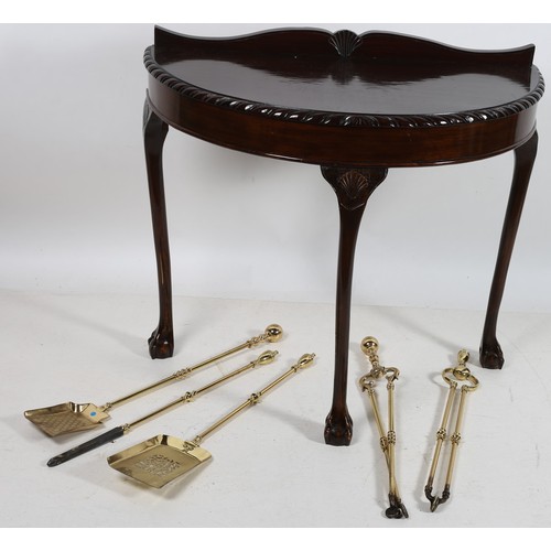 888 - TWO PART SETS OF FIRE IRONS comprising pokers tongs and shovels together with a demi lune side table