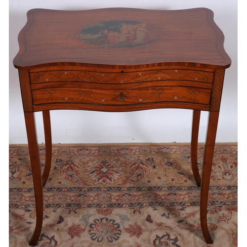 66 - AN EDWARDIAN SATINWOOD AND POLYCHROME OCCASIONAL TABLE of serpentine outline the hinged lid decorate... 